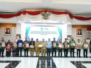 Bupati Asmar Hadiri Penyerahan Laporan BPKP di Pekanbaru, Soroti IPM dan Keterbatasan Tenaga Kesehatan di Meranti